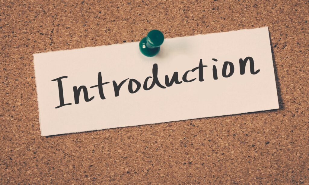 small slip of paper with "introduction" written on it pinned to a corkboard