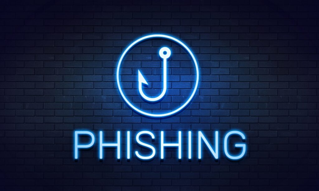 Brickwall with neon image of a fishing hook over the words Phishing