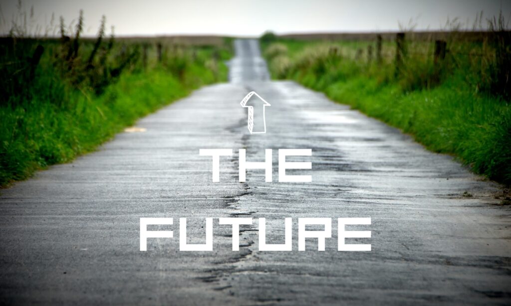 long road with the words "the future" written and an arrow
