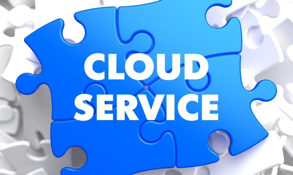 a group of four blue puzzle pieces put together that say "cloud service" on them