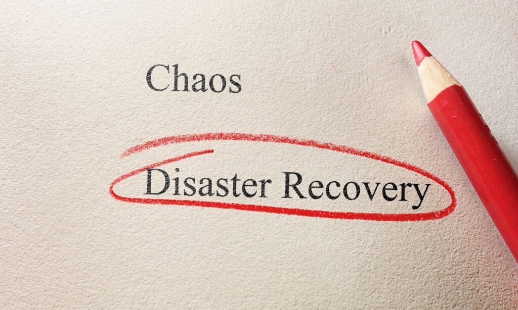 a piece of paper with the words "chaos" and "disaster recovery" and the latter is circled in red